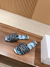 DIOR 26S SLIDE SANDALS IN BLUE FLORAL PRINT LOGO STRAP
