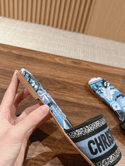 DIOR 26S SLIDE SANDALS IN BLUE FLORAL PRINT LOGO STRAP